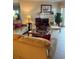 Living room with fireplace and comfortable seating at 18400 Gulf Blvd # 1505, Indian Shores, FL 33785