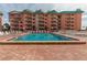 Inviting resort-style pool with ample lounge chairs at 18400 Gulf Blvd # 1505, Indian Shores, FL 33785