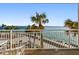 Relax on the private balcony with ocean views, perfect for enjoying the coastal breeze at 200 1St Ave # 312, St Pete Beach, FL 33706