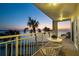 Enjoy outdoor living on this charming balcony with room for seating and views of the water at 200 1St Ave # 312, St Pete Beach, FL 33706