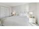 Serene bedroom with a view of the ocean and a stylish decor at 200 1St Ave # 312, St Pete Beach, FL 33706