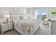 Bright bedroom with access to balcony and water views at 200 1St Ave # 312, St Pete Beach, FL 33706