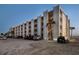 Condo exterior showing private balconies and convenient parking at 200 1St Ave # 312, St Pete Beach, FL 33706