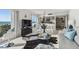 Bright living room with dining area and ocean views at 200 1St Ave # 312, St Pete Beach, FL 33706