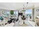 Spacious living room with ocean views, dining area, and stylish furnishings for comfortable living at 200 1St Ave # 312, St Pete Beach, FL 33706