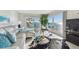 Cozy living room featuring ocean views and comfortable seating at 200 1St Ave # 312, St Pete Beach, FL 33706