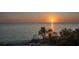 Enjoy panoramic ocean views during a stunning sunset from this coastal paradise at 200 1St Ave # 312, St Pete Beach, FL 33706