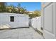 White shed and paved patio in backyard at 201 S Shore Crest Dr, Tampa, FL 33609