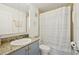 Updated bathroom with granite vanity and tub shower combo at 210 5Th S Ave # 307, St Petersburg, FL 33701