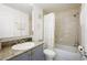 Clean bathroom, granite vanity, tub/shower, and updated fixtures at 210 5Th S Ave # 307, St Petersburg, FL 33701