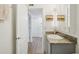 Bathroom features granite vanity and updated fixtures at 210 5Th S Ave # 307, St Petersburg, FL 33701