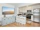 Modern kitchen with stainless steel appliances and granite countertops at 210 5Th S Ave # 307, St Petersburg, FL 33701