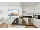 Eat-in kitchen boasts granite countertops and stainless steel appliances at 210 5Th S Ave # 307, St Petersburg, FL 33701