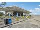 Outdoor cafe with tables and umbrellas at 210 5Th S Ave # 307, St Petersburg, FL 33701