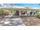 Mid-century house with carport and mature trees at 2148 Cunningham Dr, Clearwater, FL 33763