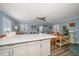 Modern kitchen with white cabinets and an island at 2215 1St St # A & B, Indian Rocks Beach, FL 33785