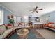 Coastal living room with a comfy couch and kitchen view at 2215 1St St # A & B, Indian Rocks Beach, FL 33785