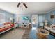 Open living space with comfy seating and flat screen tv at 2215 1St St # A & B, Indian Rocks Beach, FL 33785