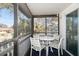 Enjoy dining alfresco on this screened porch with table and chairs at 2215 1St St # A & B, Indian Rocks Beach, FL 33785