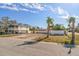 Empty lot with a view of neighboring homes at 2215 1St St # A & B, Indian Rocks Beach, FL 33785