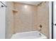 Bathroom with shower/tub combo and tile surround at 2302 S Manhattan Ave # 315, Tampa, FL 33629