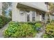Townhouse exterior with landscaping and satellite dish at 2794 Countryside Blvd # 1, Clearwater, FL 33761