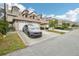 Two-story townhome with attached garage and driveway, in a community setting at 2794 Countryside Blvd # 1, Clearwater, FL 33761