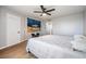 Bedroom with hardwood floors and ocean-themed wall art at 3062 Eastland Blvd # 405, Clearwater, FL 33761