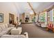 Bright community room with comfortable seating area at 3062 Eastland Blvd # 405, Clearwater, FL 33761