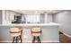 Modern kitchen with breakfast bar and stainless steel appliances at 3062 Eastland Blvd # 405, Clearwater, FL 33761