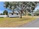 Side view of the house showcasing landscaping at 3700 12Th N St, St Petersburg, FL 33704