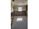 Unfinished basement with exposed walls and concrete floor at 4119 Harrisburg Ne St, St Petersburg, FL 33703