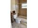 Bathroom with bathtub, toilet, and tiled walls at 4119 Harrisburg Ne St, St Petersburg, FL 33703