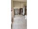 Unfinished laundry room with new toilet and water heater at 4119 Harrisburg Ne St, St Petersburg, FL 33703