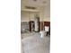 Unfinished laundry room with new toilet and water heater at 4119 Harrisburg Ne St, St Petersburg, FL 33703