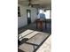 Screened patio with concrete floor and table at 4119 Harrisburg Ne St, St Petersburg, FL 33703