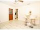 Small dining area with a white table and four barstools at 4427 Gandy Cir, Tampa, FL 33616