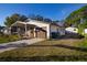 Cozy single-story home with carport and a spacious yard at 4427 Gandy Cir, Tampa, FL 33616