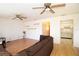 Open living room and kitchen area with hardwood floors at 4427 Gandy Cir, Tampa, FL 33616