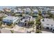Luxury waterfront home with private driveway and lush landscaping at 519 Loquat Dr, Anna Maria, FL 34216