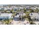 Aerial view of waterfront home with private dock and amazing water access at 519 Loquat Dr, Anna Maria, FL 34216