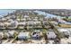 Waterfront property with canal views and surrounding houses at 519 Loquat Dr, Anna Maria, FL 34216