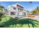 Luxury home with pool, spa, putting green, and patio at 519 Loquat Dr, Anna Maria, FL 34216