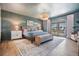 Spacious main bedroom with wood floors and water view at 519 Loquat Dr, Anna Maria, FL 34216
