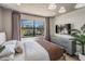 Spacious bedroom with large windows offering water views at 519 Loquat Dr, Anna Maria, FL 34216