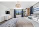 King bedroom with water view and modern decor at 519 Loquat Dr, Anna Maria, FL 34216