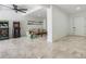Fun game room with arcade games, comfortable seating, and tile flooring at 519 Loquat Dr, Anna Maria, FL 34216