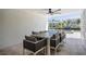 Outdoor patio with seating and a view of the waterfront at 519 Loquat Dr, Anna Maria, FL 34216