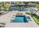 Elevated view of a luxurious pool and spa at 519 Loquat Dr, Anna Maria, FL 34216
