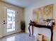 Welcoming foyer with a stylish console table and a view of the front entrance at 5201 Cicero Dr, New Port Richey, FL 34652